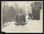 [Two men on a snow sledge with horses] by Unknown