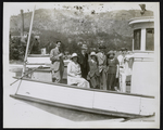 [People posing on a boat] by Unknown