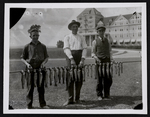 [Three Men Hold a Line up of Fresh Catch] by Unknown