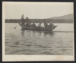 Men in a Bateau Securing a Log by Unknown