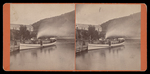 [Boat on river, mountain in the background] by Unknown