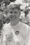 Smiling woman wearing "MAINE WON'T DISCRIMINATE" sticker