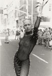 Woman in spiked bodysuit by Tom Antonik