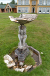 The Maine Chance Farm Renovation - Front Lawn Fountain with Main House in Background by Marina Douglas