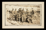 Soldiers Posing with Work Tools Photograph